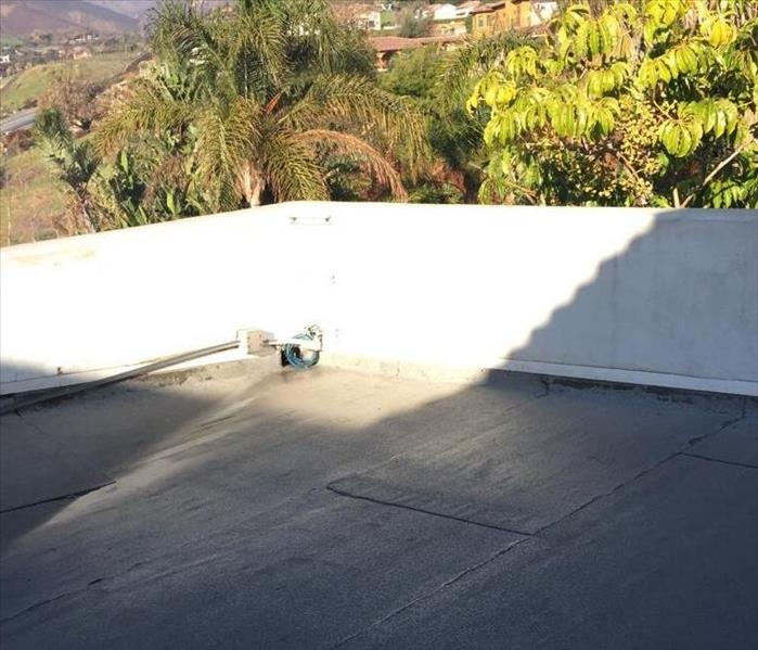 Roof of home in Malibu with smoke and soot damage