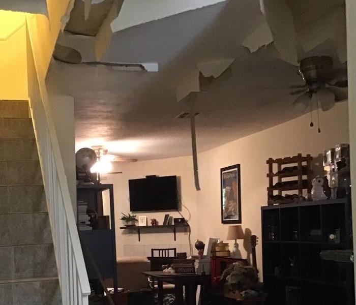 Buckling ceiling in living room