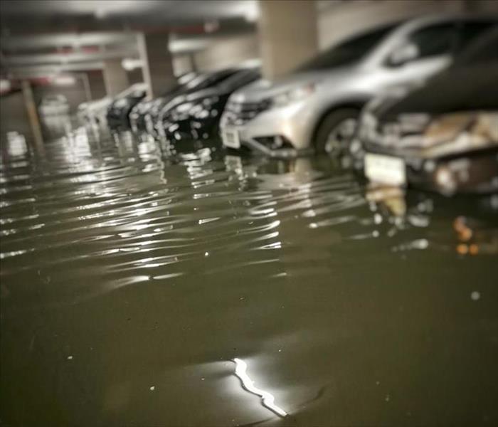 flooding car in basement carpark at condominium