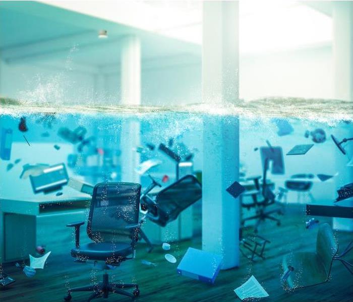 office furniture and supplies submerged under water in an office room